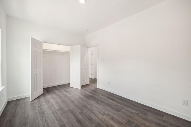 5608 Hollow Pines Dr, Houston, TX 77049 - unfurnished bedroom with dark wood-style floors, a closet, and recessed lighting
