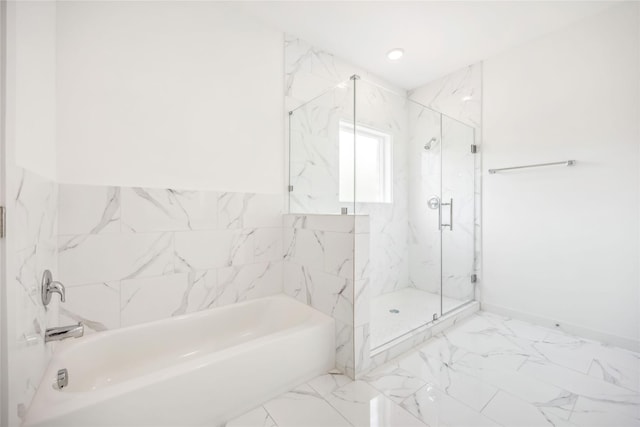 5608 Hollow Pines Dr, Houston, TX 77049 - full bath featuring a garden tub, a marble finish shower, and marble finish floors