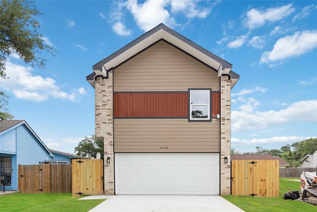 5608 Hollow Pines Dr, Houston, TX 77049 - view of front of property featuring brick siding, concrete driveway, and a garage