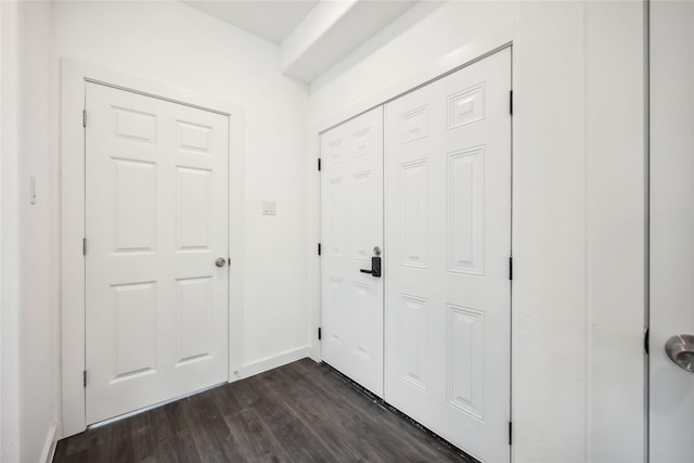 5608 Hollow Pines Dr, Houston, TX 77049 - entrance foyer with dark wood-type flooring and baseboards