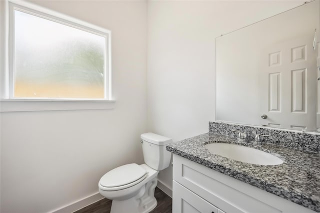 5608 Hollow Pines Dr, Houston, TX 77049 - half bath with vanity and wood finished floors