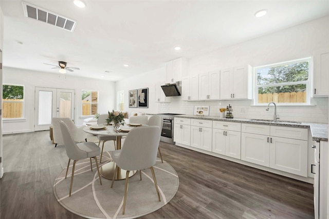 5608 Hollow Pines Dr, Houston, TX 77049 - dining space featuring healthy amount of natural light, dark wood-style floors, a ceiling fan, and recessed lighting