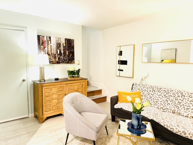 1531 Marshall St Unit 3, Houston, TX 77006 - living room featuring light wood-style floors and bar with sink