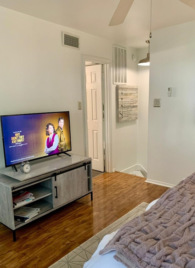1531 Marshall St Unit 3, Houston, TX 77006 - living room with wood finished floors, baseboards, and a ceiling fan