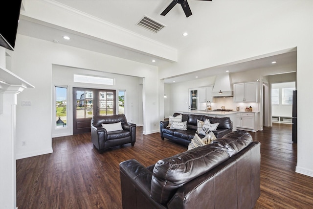 4112 Leslies Way, Dickinson, TX 77539 - living area featuring a ceiling fan, dark wood-type flooring, recessed lighting, plenty of natural light, and baseboards
