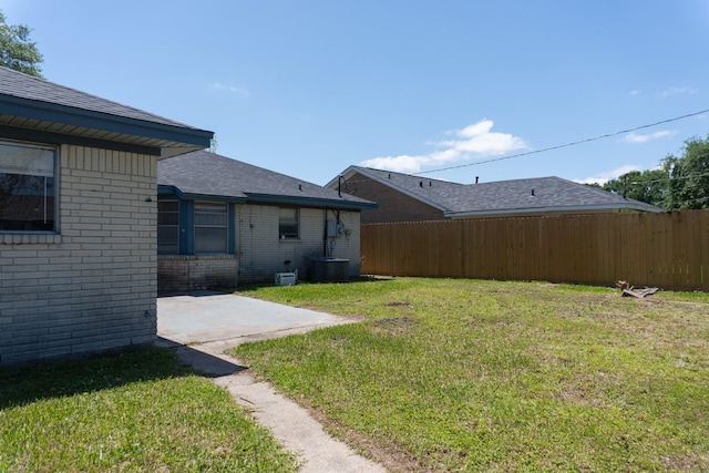 702 Meadowglen Dr, Baytown, TX 77521 - view of yard featuring a patio area