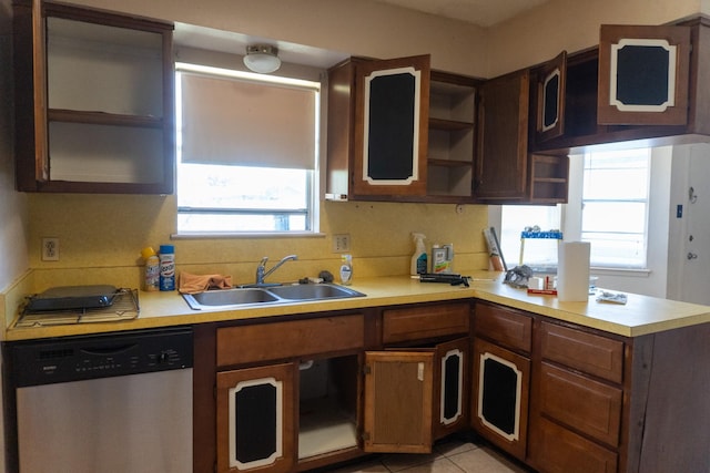 702 Meadowglen Dr, Baytown, TX 77521 - kitchen with dishwasher, open shelves, plenty of natural light, and light countertops