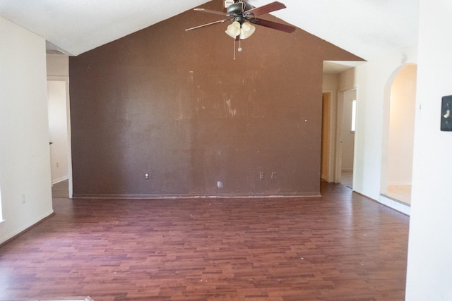 702 Meadowglen Dr, Baytown, TX 77521 - spare room with arched walkways, a ceiling fan, wood finished floors, and high vaulted ceiling