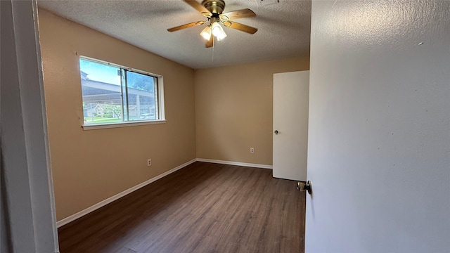 702 Meadowglen Dr, Baytown, TX 77521 - unfurnished room featuring wood finished floors, a textured ceiling, and a ceiling fan