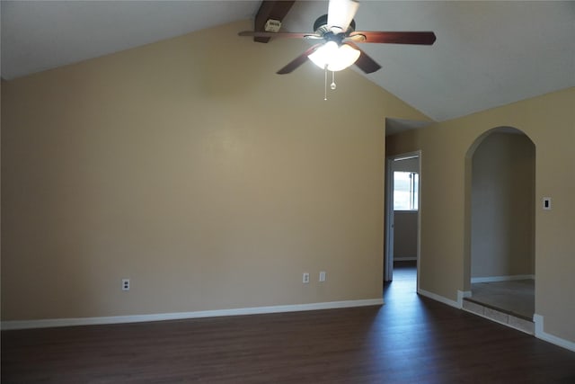 702 Meadowglen Dr, Baytown, TX 77521 - spare room with a ceiling fan, arched walkways, and dark wood-style flooring