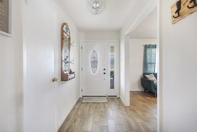 1314 Hancock Ave, Pasadena, TX 77502 - foyer entrance with light wood finished floors and baseboards