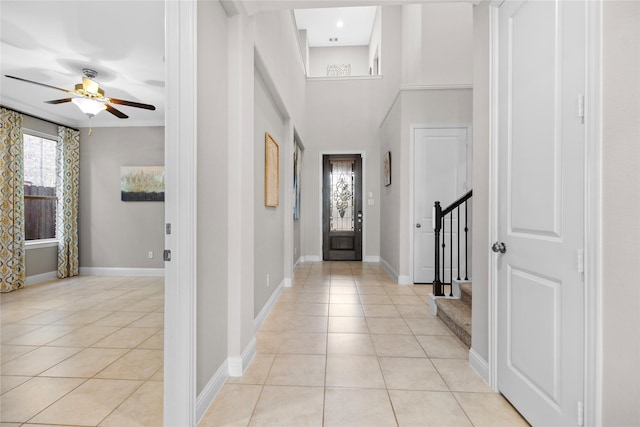 3507 Canyon Branch Ln, Fulshear, TX 77441 - foyer featuring light tile patterned flooring, a ceiling fan, and baseboards