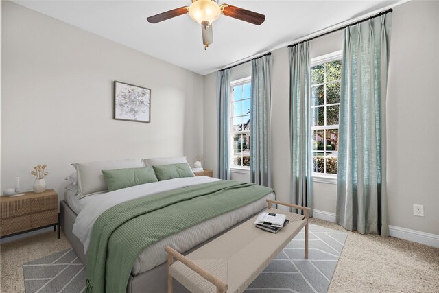 3507 Canyon Branch Ln, Fulshear, TX 77441 - carpeted bedroom with baseboards and a ceiling fan