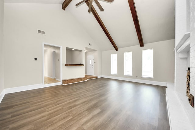 4203 Steep Rock Dr, Pasadena, TX 77504 - unfurnished living room with high vaulted ceiling, ceiling fan, a fireplace, beamed ceiling, and baseboards