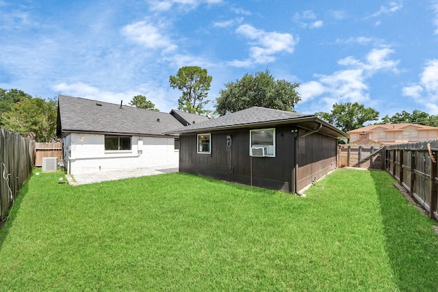 4203 Steep Rock Dr, Pasadena, TX 77504 - back of property featuring central AC unit, a patio, cooling unit, roof with shingles, and brick siding