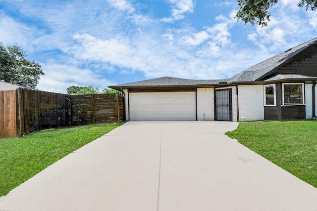 4203 Steep Rock Dr, Pasadena, TX 77504 - view of front of house featuring an attached garage, driveway, and brick siding