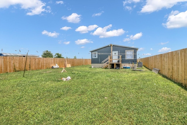 497 Rd 5603, Cleveland, TX 77327 - back of house with central AC