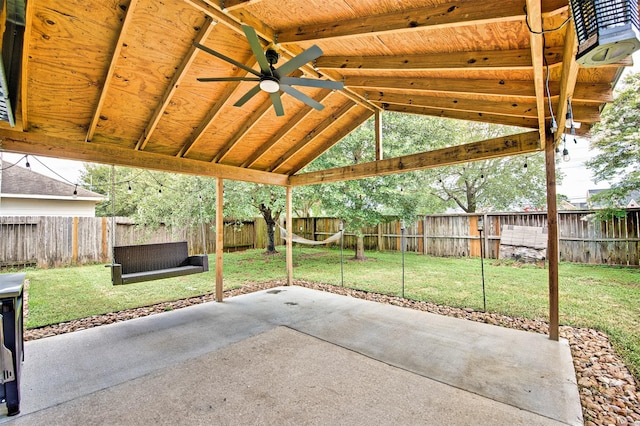 7022 Raven Cliffs Ln, Spring, TX 77379 - fenced backyard featuring a patio and a ceiling fan