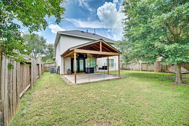7022 Raven Cliffs Ln, Spring, TX 77379 - back of house featuring a patio and a fenced backyard