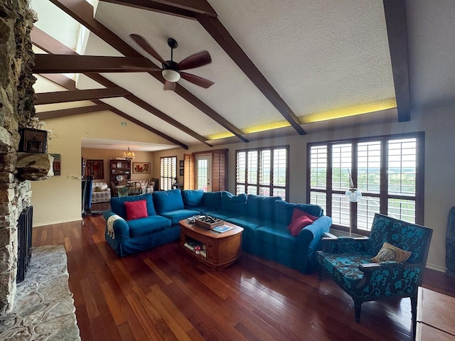 760 Skyline Rdg, Lookout, Wimberley, TX 78676 - living room featuring ceiling fan, plenty of natural light, wood finished floors, a chandelier, and a textured ceiling