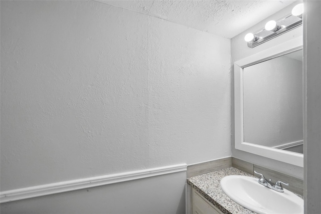 2251 Middle Creek Dr, Houston, TX 77339 - bathroom with vanity and a textured ceiling