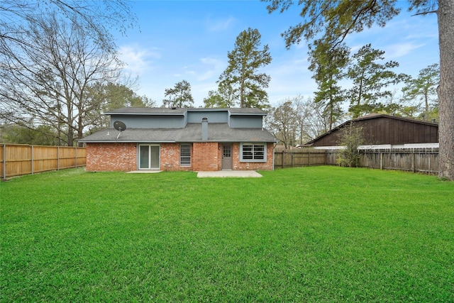 2251 Middle Creek Dr, Houston, TX 77339 - rear view of property with a patio area, brick siding, and a shingled roof