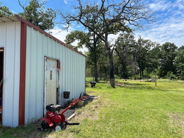2406 W US Highway 79, Buffalo, TX 75831 - view of green lawn with an outdoor structure
