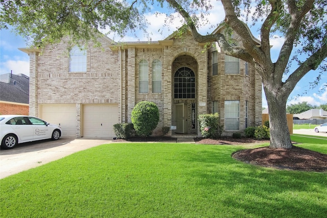 6819 Olympia Dr, Pasadena, TX 77505 - view of front facade with an attached garage, a front lawn, brick siding, and driveway