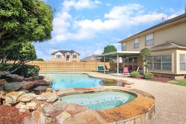 6819 Olympia Dr, Pasadena, TX 77505 - view of pool featuring a fenced backyard, a patio area, a ceiling fan, and a pool with connected hot tub