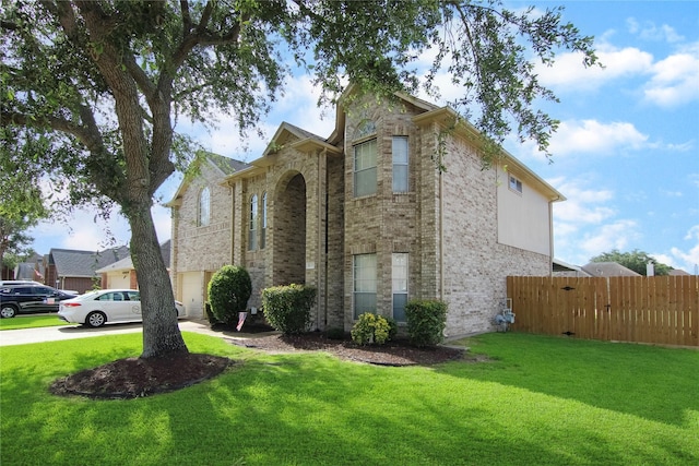 6819 Olympia Dr, Pasadena, TX 77505 - view of front of home with brick siding, concrete driveway, and a garage