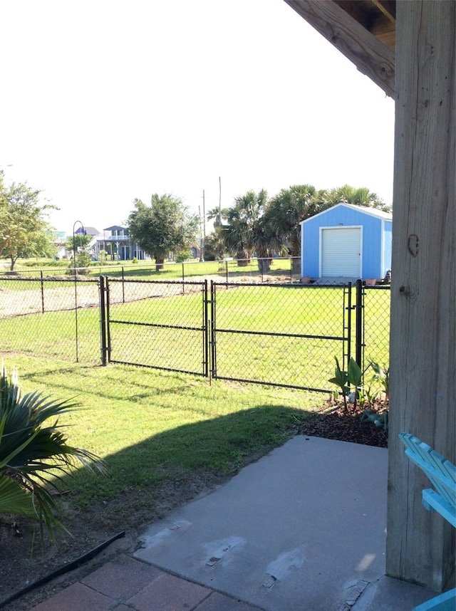 915 Sandollar, Crystal Beach, TX 77650 - view of yard with a gate and an outbuilding