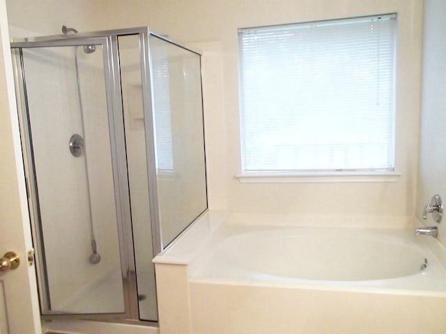 20210 Arbolada Green Ct, Humble, TX 77346 - bathroom with a shower stall and a bath