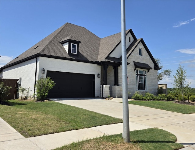 5619 Water Lilies Cor, Manvel, TX 77578 - view of front of house with concrete driveway, a shingled roof, stone siding, brick siding, and an attached garage