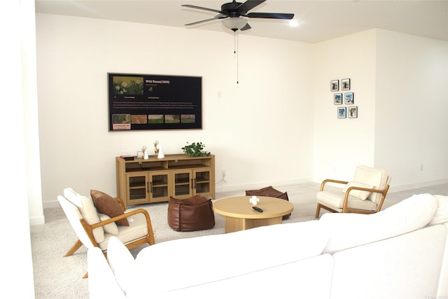5619 Water Lilies Cor, Manvel, TX 77578 - carpeted living area featuring ceiling fan and baseboards