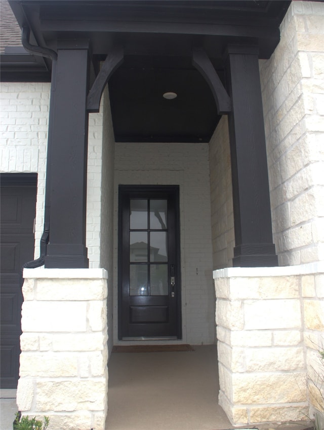 5619 Water Lilies Cor, Manvel, TX 77578 - doorway to property with brick siding