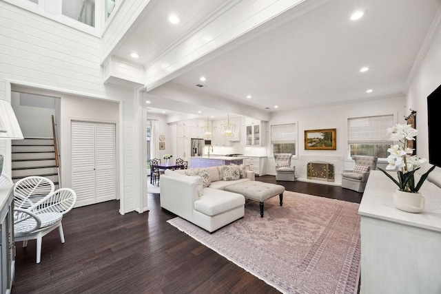 6000 Sugar Hill Dr Unit 1, Houston, TX 77057 - living area featuring crown molding, stairway, dark wood finished floors, recessed lighting, and a fireplace