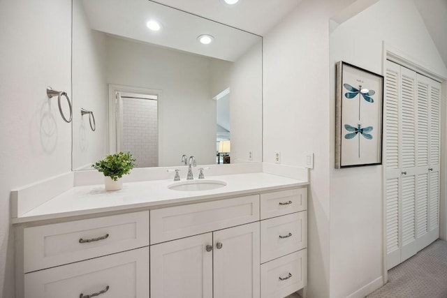 6000 Sugar Hill Dr Unit 1, Houston, TX 77057 - bathroom featuring vanity, recessed lighting, and a closet