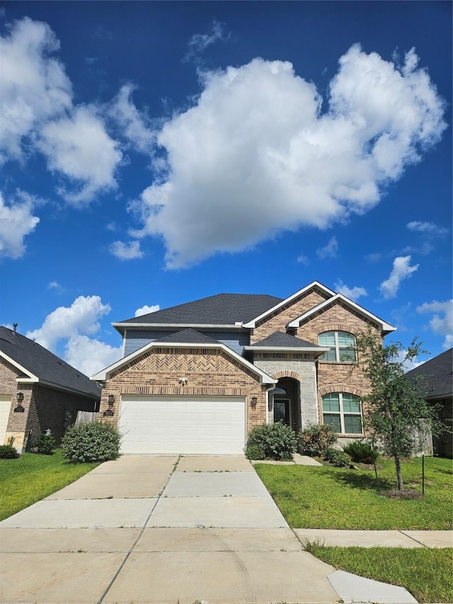 7927 Chukka Dr, Fulshear, TX 77441 - view of front of house with brick siding, concrete driveway, an attached garage, a front lawn, and roof with shingles