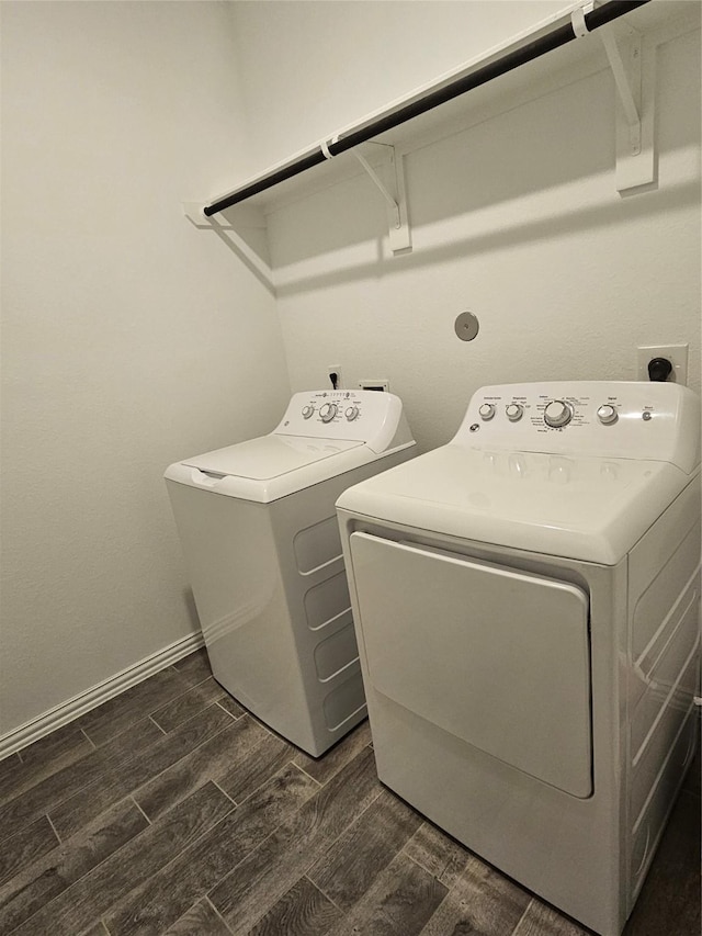 7927 Chukka Dr, Fulshear, TX 77441 - washroom featuring washing machine and dryer and wood finish floors
