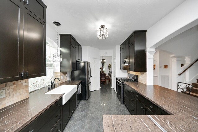 7410 Lassiter Hollow Ln, Richmond, TX 77407 - kitchen featuring stainless steel appliances, backsplash, and dark countertops