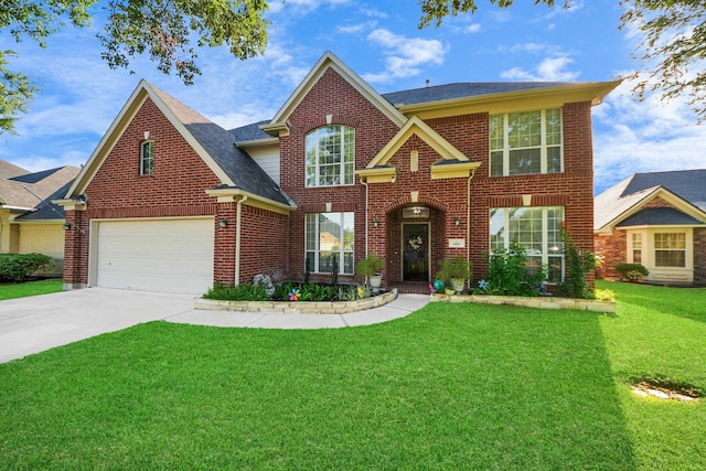 7410 Lassiter Hollow Ln, Richmond, TX 77407 - view of front of home with driveway, brick siding, a front lawn, a garage, and a shingled roof