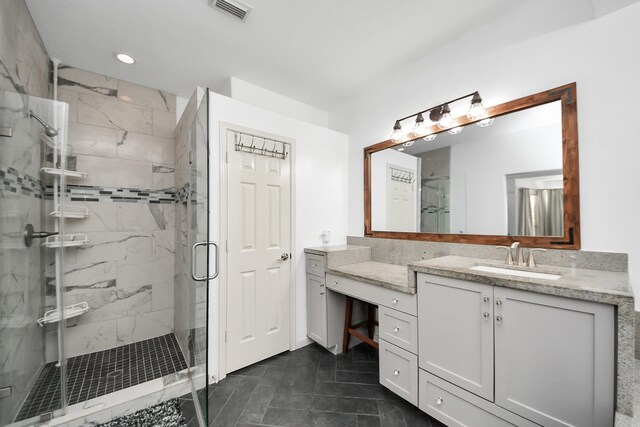 7410 Lassiter Hollow Ln, Richmond, TX 77407 - full bath featuring a marble finish shower, vanity, and recessed lighting