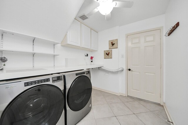 7410 Lassiter Hollow Ln, Richmond, TX 77407 - washroom with separate washer and dryer, cabinet space, a ceiling fan, and light tile patterned floors