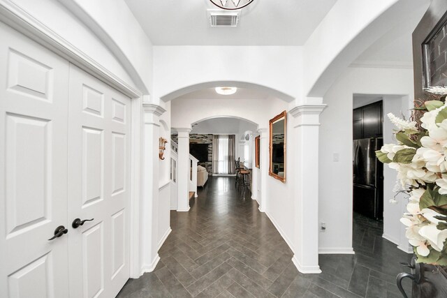 7410 Lassiter Hollow Ln, Richmond, TX 77407 - foyer entrance with decorative columns and arched walkways