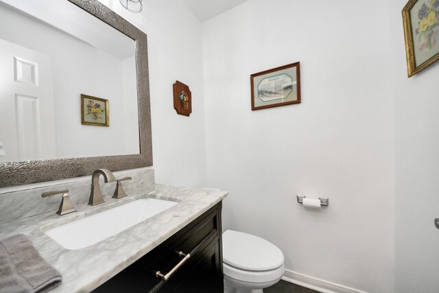 7410 Lassiter Hollow Ln, Richmond, TX 77407 - half bathroom with vanity and toilet