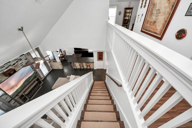 7410 Lassiter Hollow Ln, Richmond, TX 77407 - staircase with arched walkways