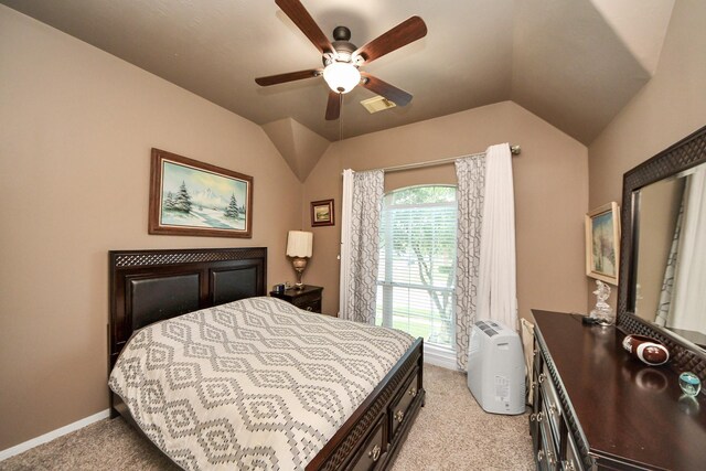 7410 Lassiter Hollow Ln, Richmond, TX 77407 - bedroom featuring light carpet, vaulted ceiling, and ceiling fan