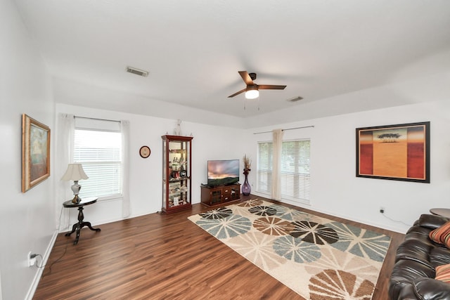 7410 Lassiter Hollow Ln, Richmond, TX 77407 - living area featuring a ceiling fan and wood finished floors