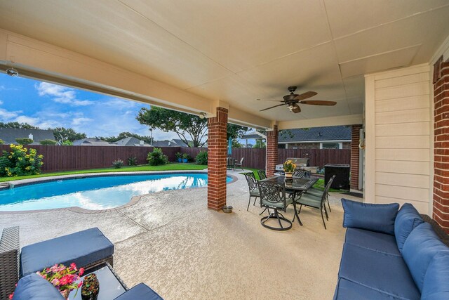 7410 Lassiter Hollow Ln, Richmond, TX 77407 - view of swimming pool with a fenced backyard, a patio, outdoor lounge area, and outdoor dining area