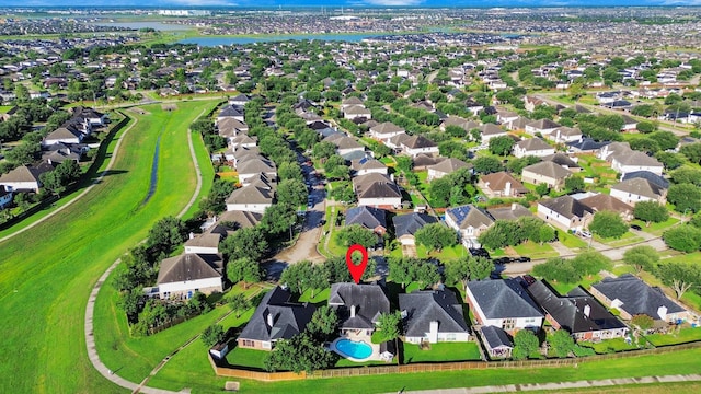 7410 Lassiter Hollow Ln, Richmond, TX 77407 - aerial perspective of suburban area featuring a nearby body of water